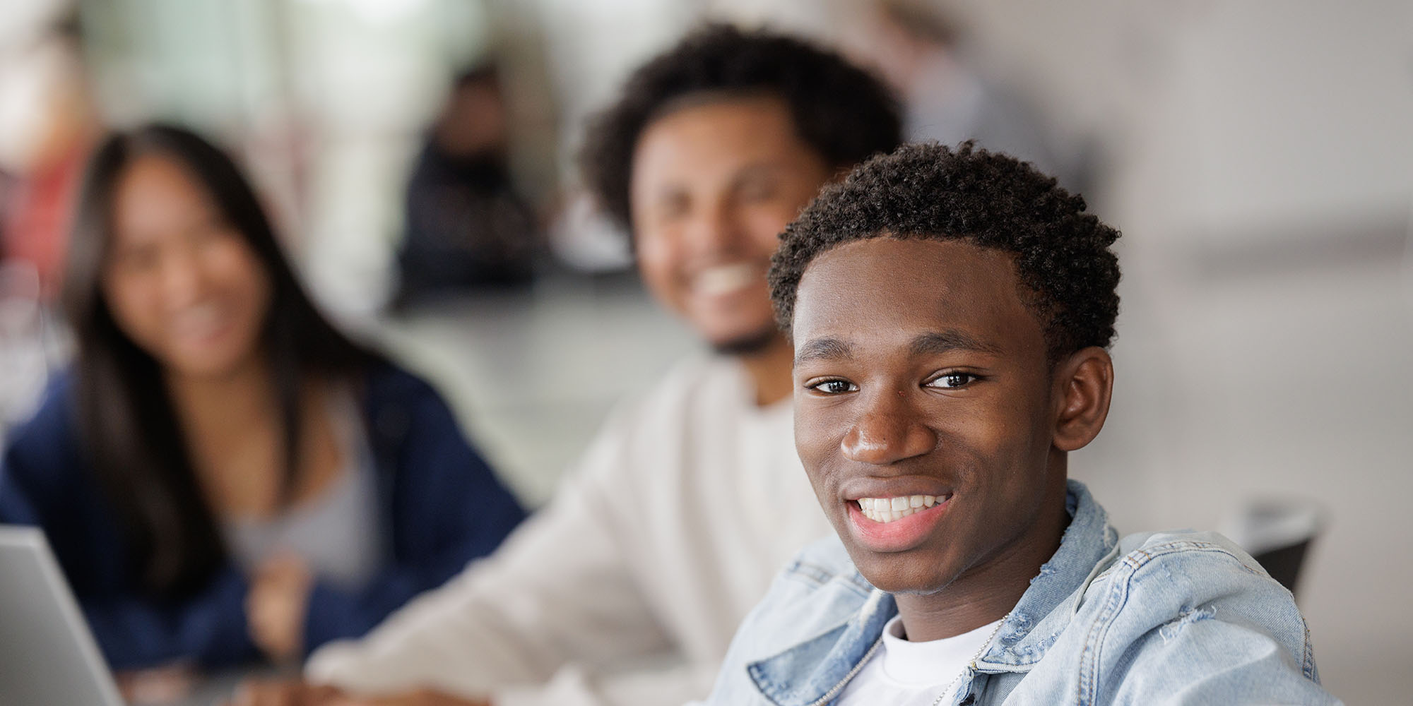 Students sitting around in student lounge